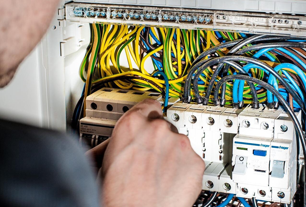 electrician working on an electrical system