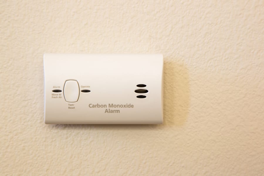 carbon monoxide detector on wall.